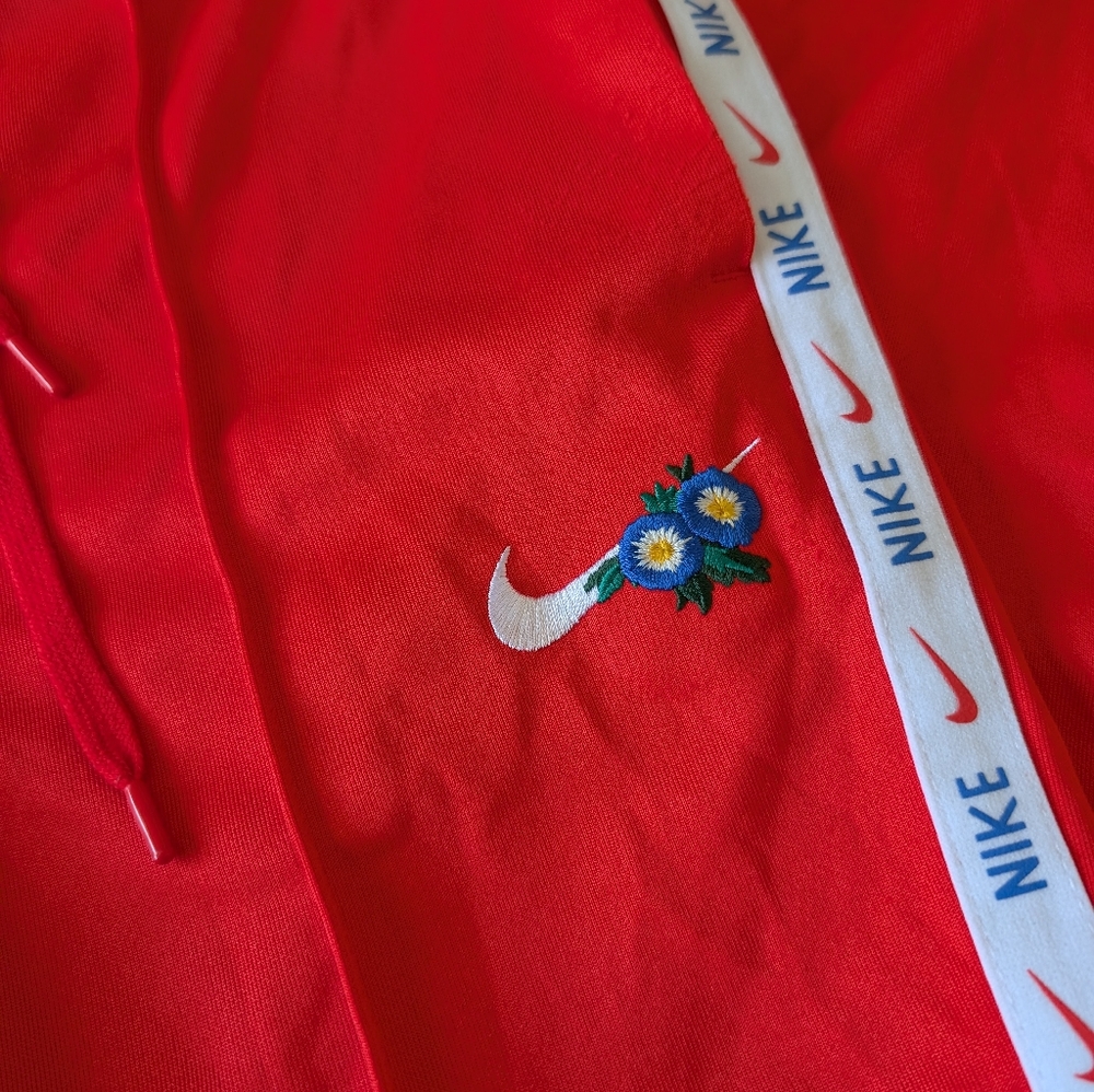 Unique Nike Women's Embroidered Feminine Athleisure Street Track Pants Red S image 3